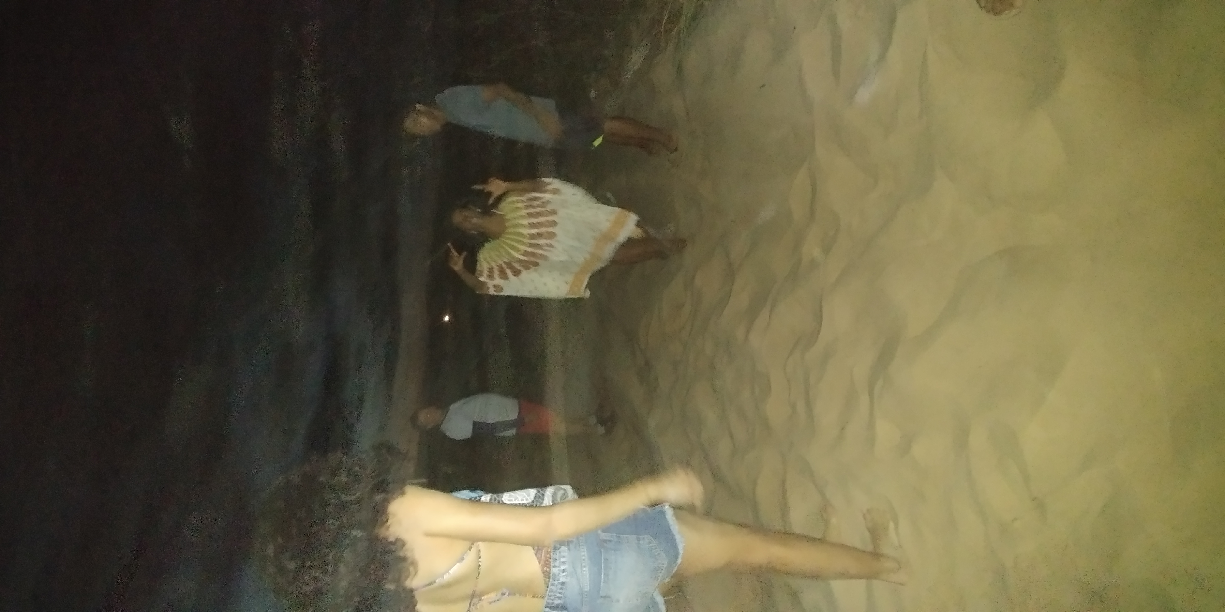 Family still having a good time after getting stuck in the sand