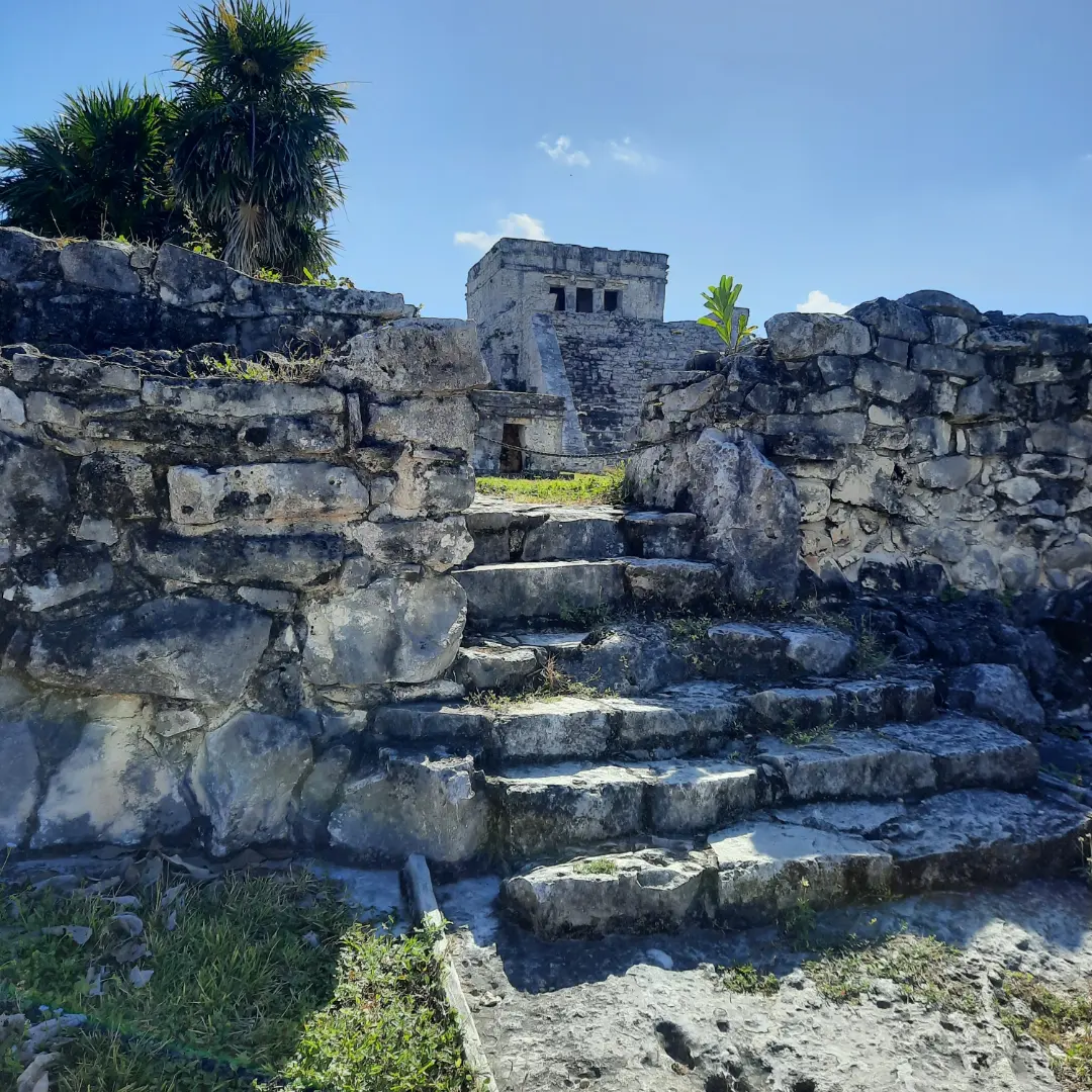 Ruins and tropical vegetation at the Tulum archaeological site